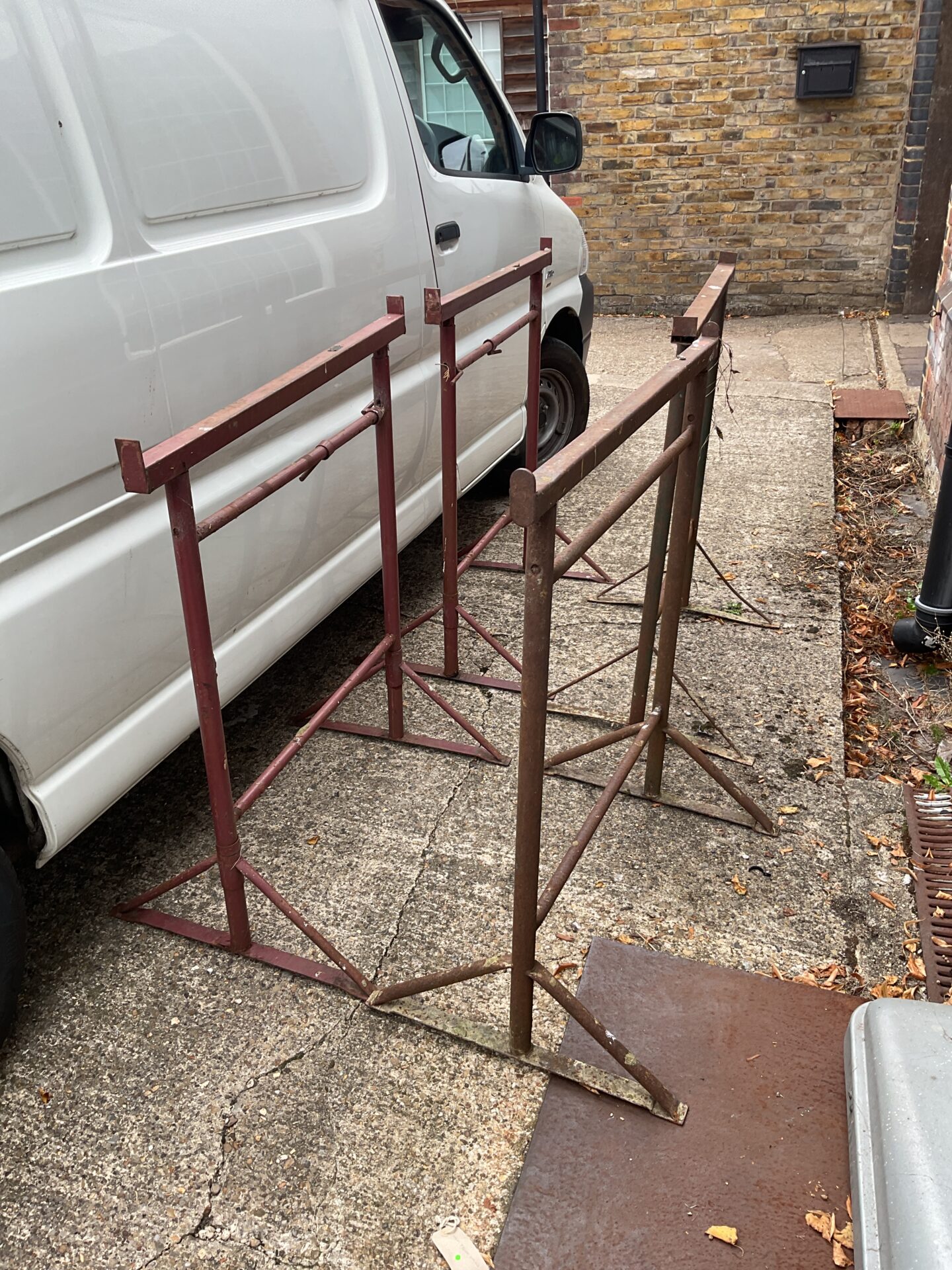 Set of four metal builders tressels for construction and DIY.