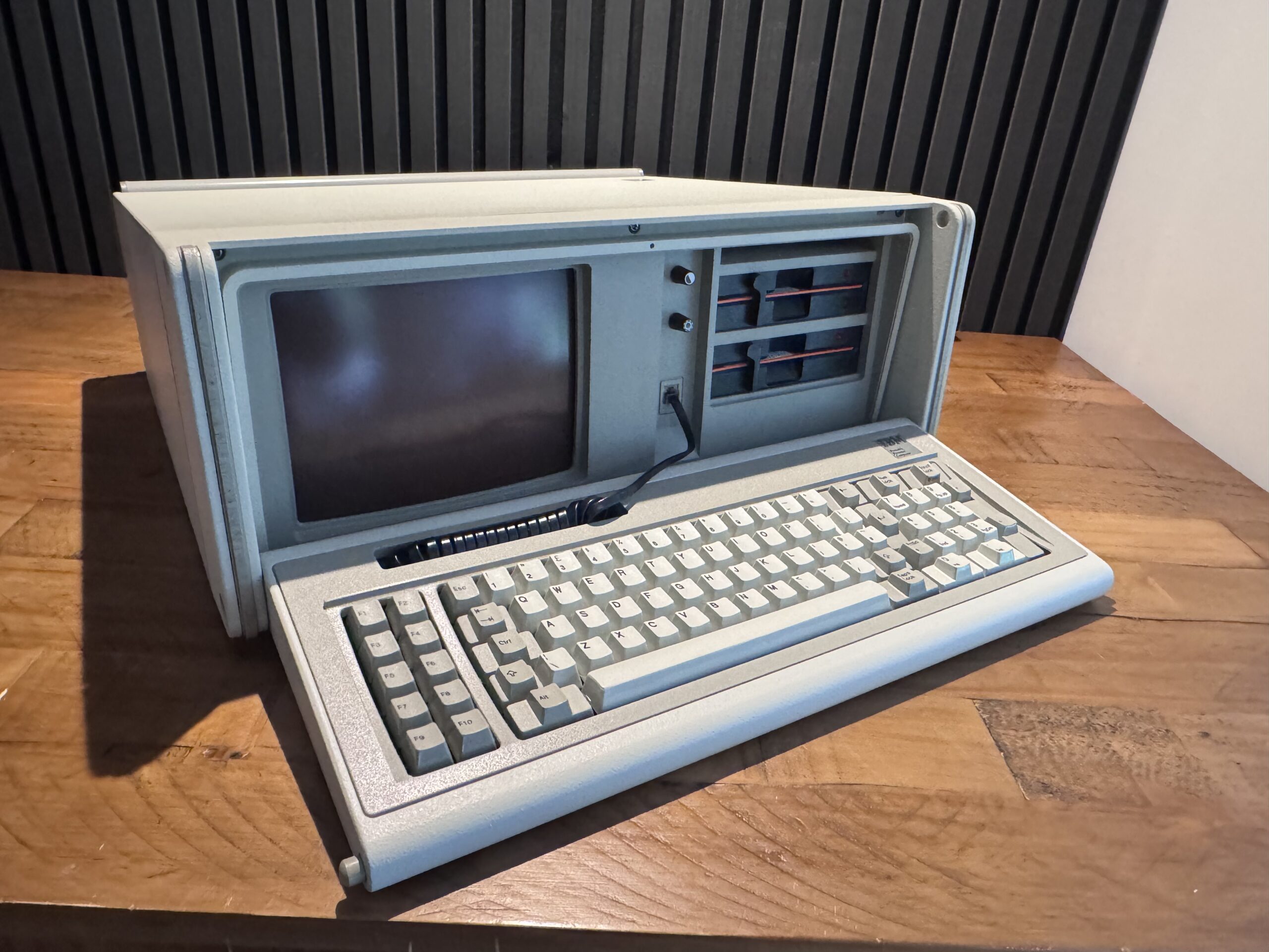 Front view of the vintage IBM 5155 portable computer.