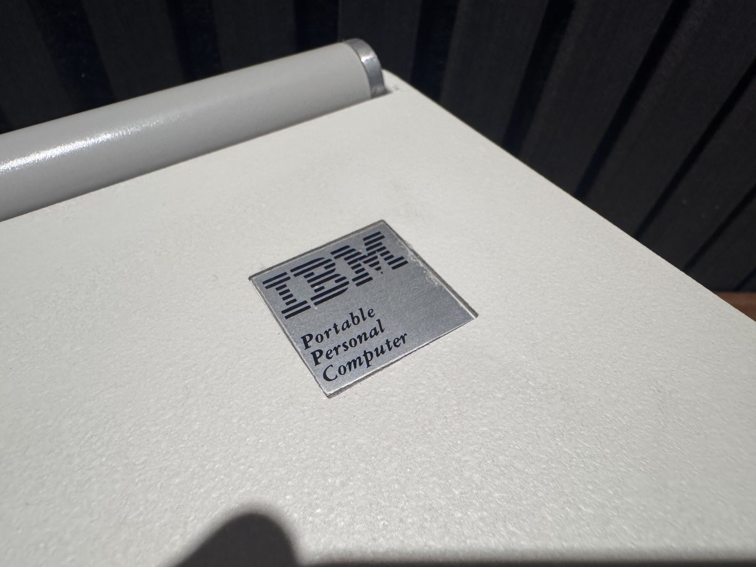 Close-up of the IBM 5155 portable computer screen.