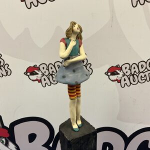 Pottery Girl Sculpture Vintage pottery girl sculpture by Elise in polka dot dress.