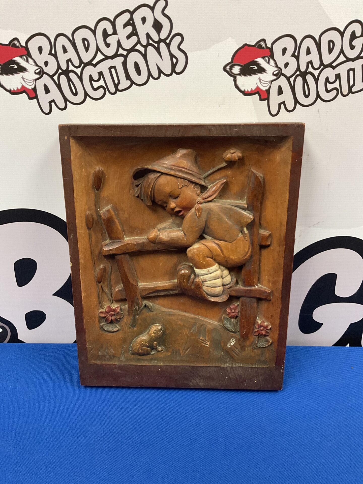 Vintage West German carved wooden panel with boy and frog.